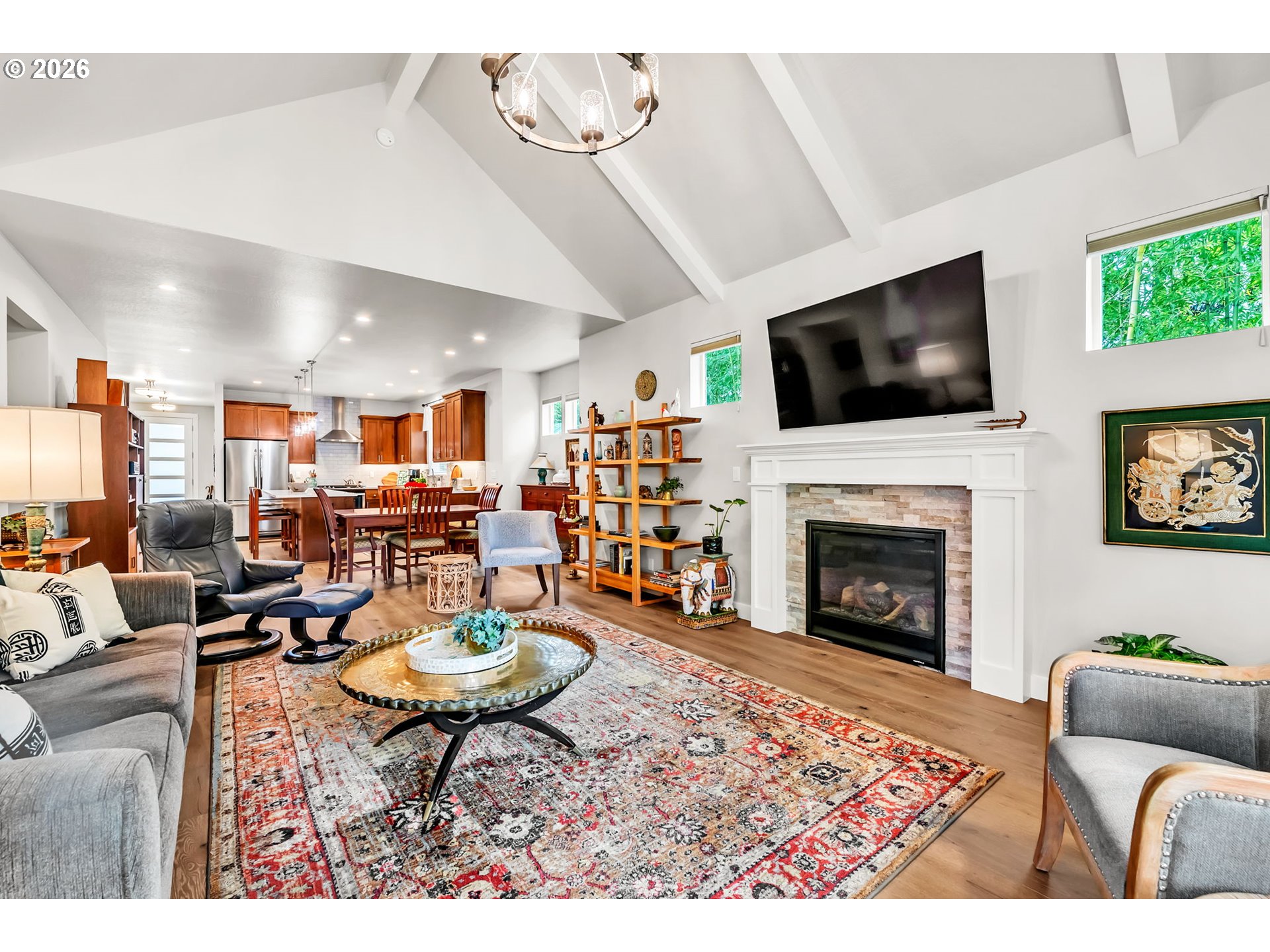444 Emily Lane Eugene, OR 97404 - Photo 24 of 47 a living room with furniture a flat screen tv and a fireplace