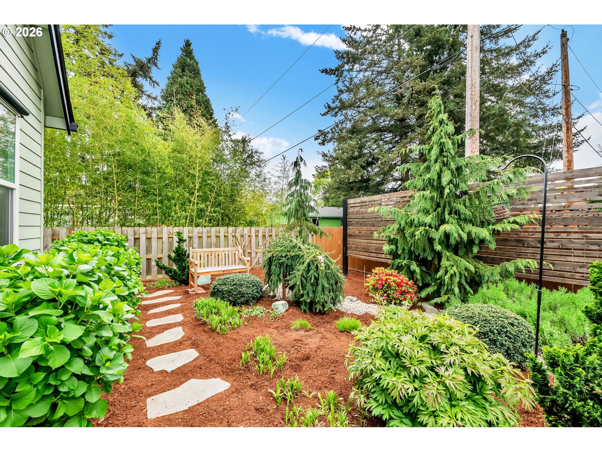 444 Emily Lane Eugene, OR 97404 - Photo 41 of 47 a view of a garden with flowers