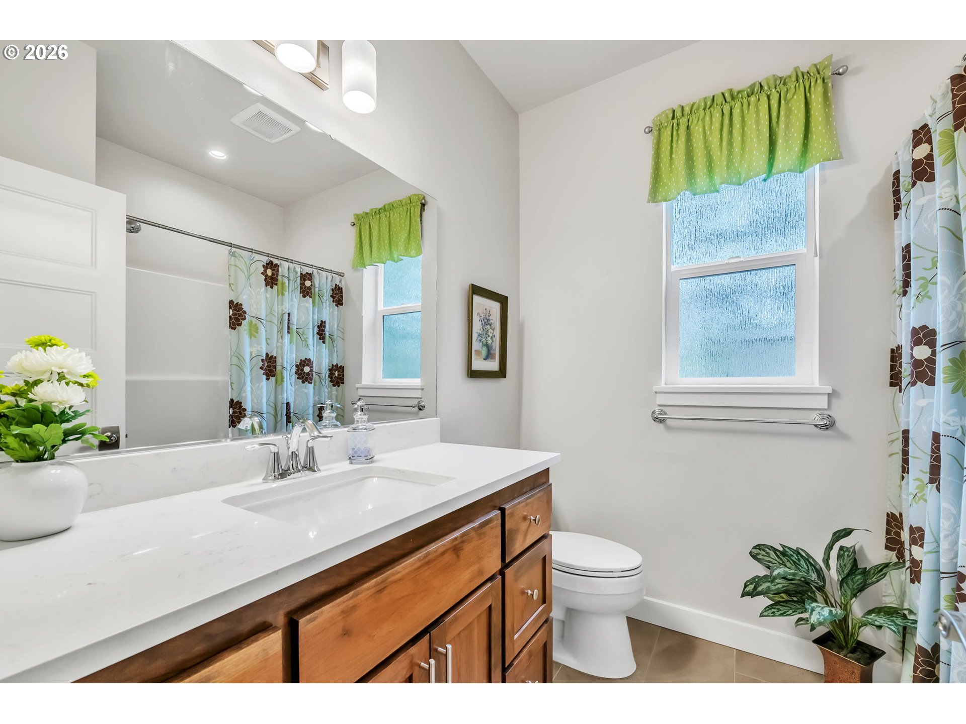 444 Emily Lane Eugene, OR 97404 - Photo 10 of 47 a bathroom with a sink a toilet and a mirror