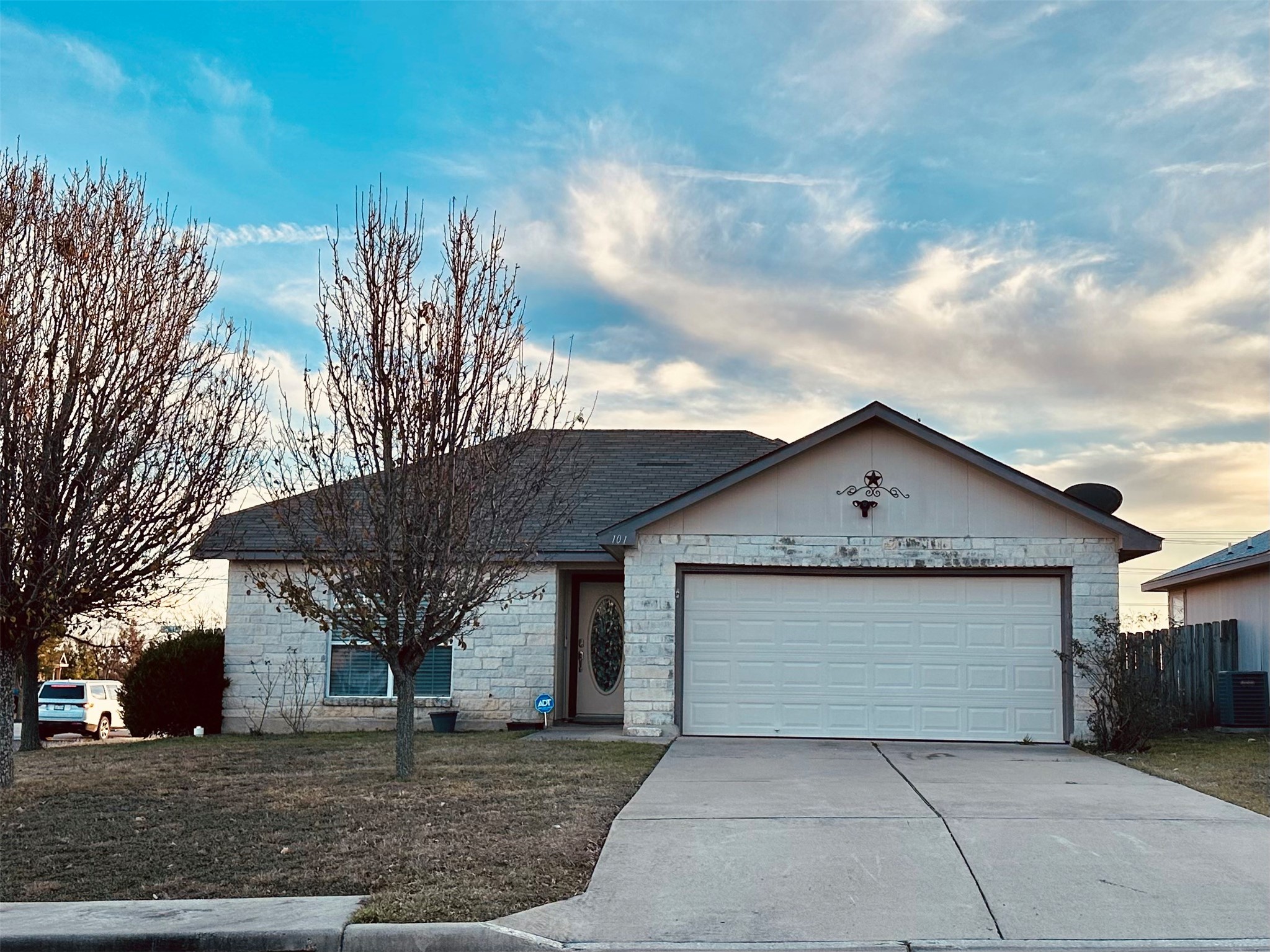 101 Engineers Pass Jarrell, TX 76537 - Photo 1 of 1 Ranch-style house with central AC and a garage
