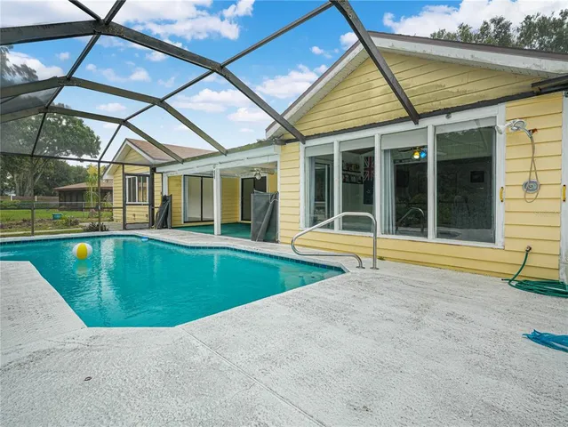 a view of a house with a swimming pool