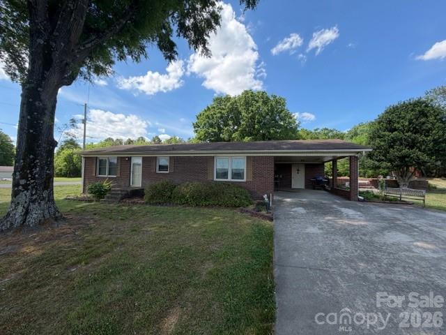 20415 Efird Road Albemarle, NC 28001 - Photo 1 of 16 a view of house with outdoor space and garden