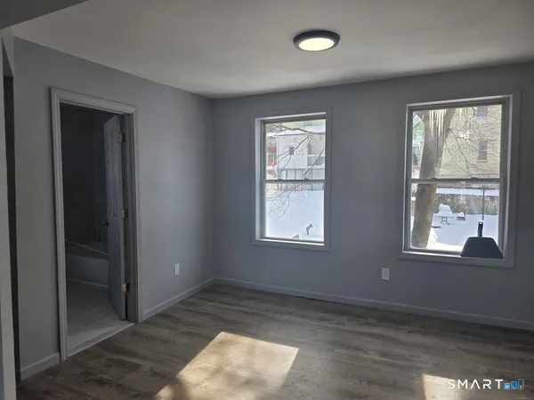 an empty room with windows