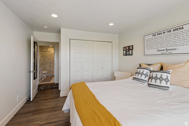 1900 North 100 East Provo, UT 84604 - Photo 30 of 49 Bedroom featuring wood-finish flooring, recessed lighting, and white bi-fold closet doors