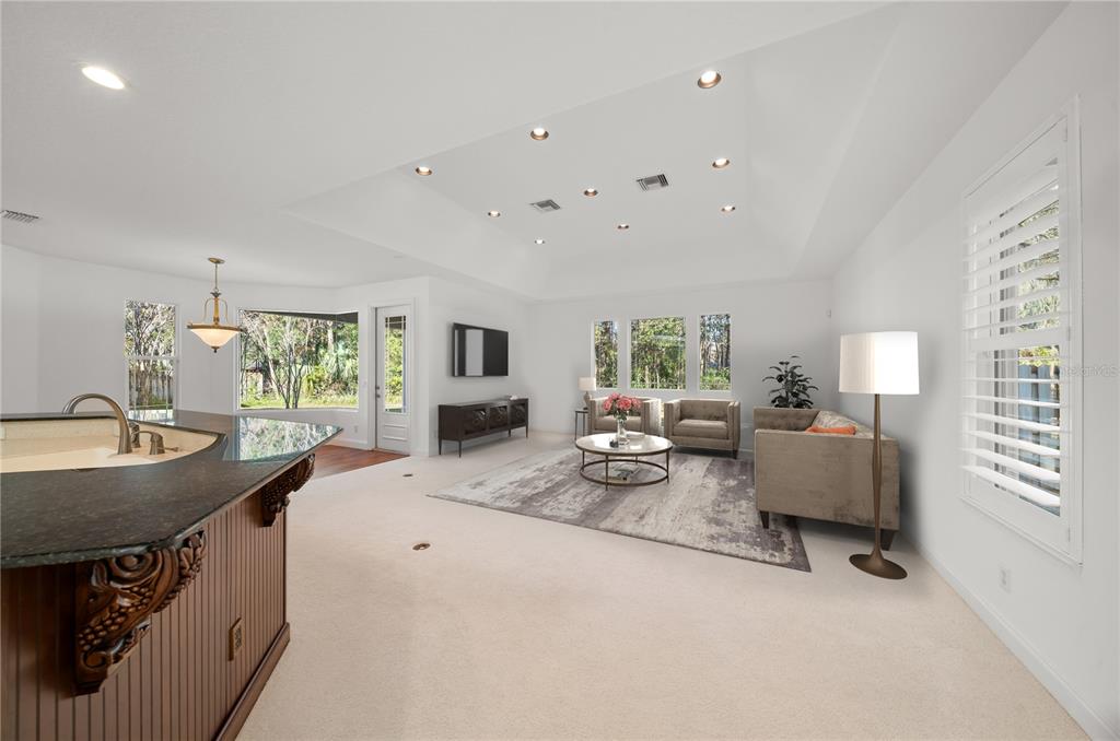4929 Southwest 2nd Court Ocala, FL 34471 - Photo 17 of 60 a living room with furniture and a large window