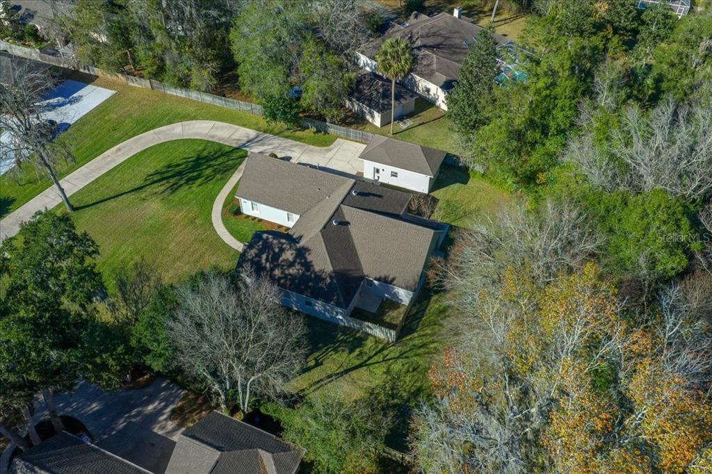 4929 Southwest 2nd Court Ocala, FL 34471 - Photo 45 of 60 an aerial view of a house with outdoor space and a lake view