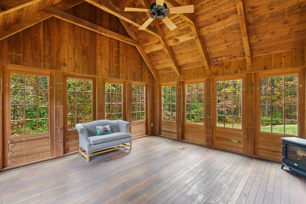 88 Bullard Road Princeton, MA 01541 - Photo 14 of 41 a living room with furniture and large windows
