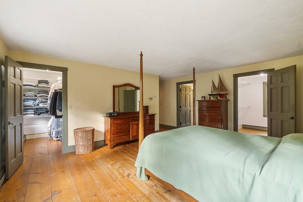 88 Bullard Road Princeton, MA 01541 - Photo 27 of 41 a large bedroom with a large bed and furniture