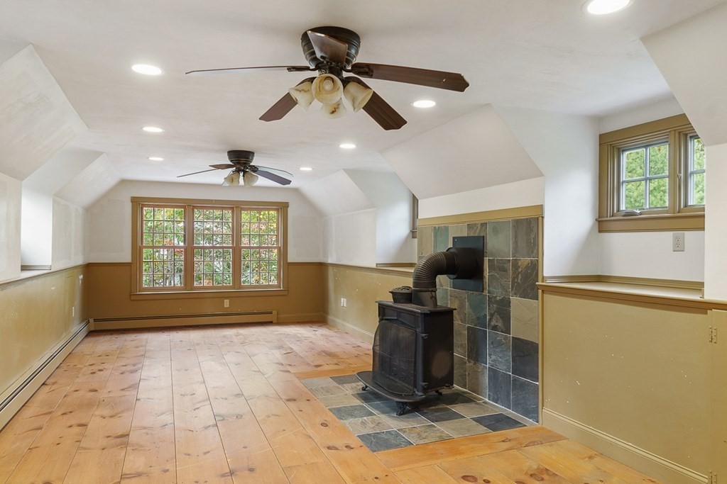88 Bullard Road Princeton, MA 01541 - Photo 30 of 41 a view of empty room with wooden floor and fan