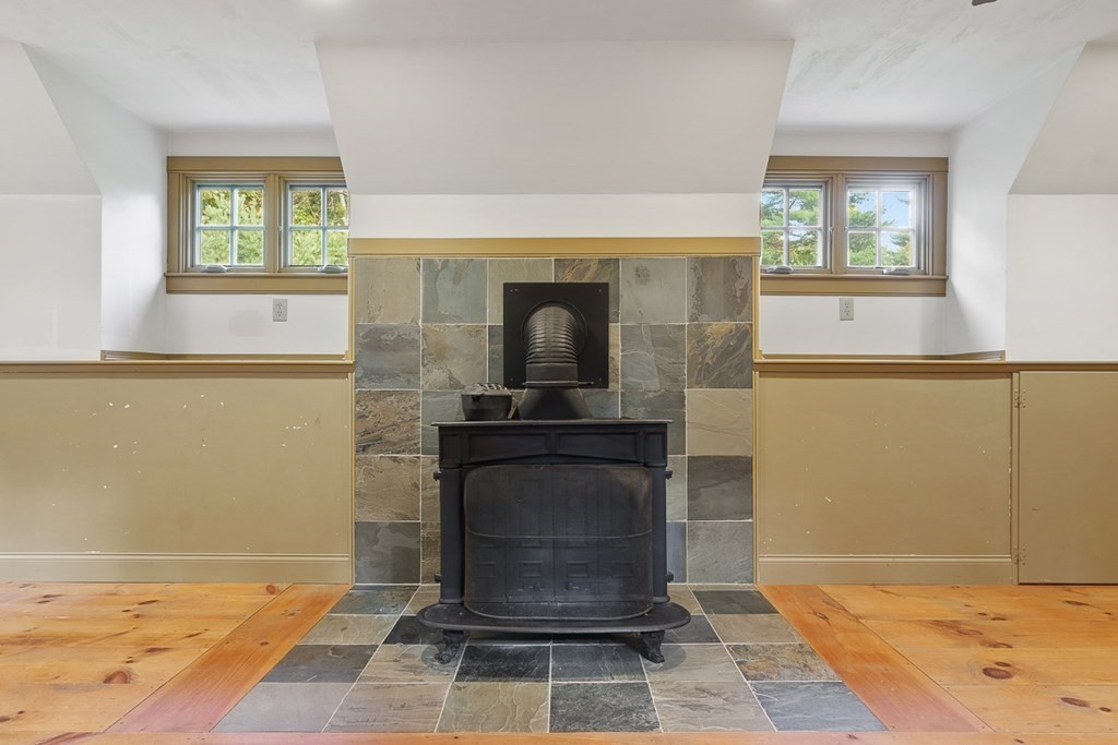 88 Bullard Road Princeton, MA 01541 - Photo 31 of 41 a living room with a fireplace