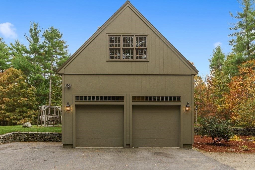 88 Bullard Road Princeton, MA 01541 - Photo 38 of 41 a front view of a house with a garage