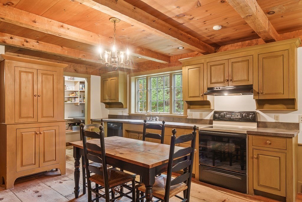 88 Bullard Road Princeton, MA 01541 - Photo 7 of 41 a kitchen with cabinets appliances and a counter