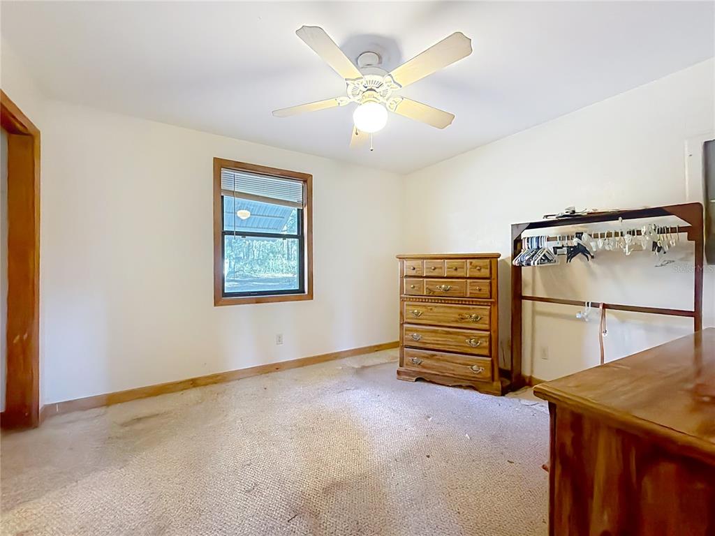 3175 Southwest 181st Court Dunnellon, FL 34432 - Photo 13 of 35 an empty room with windows and closet
