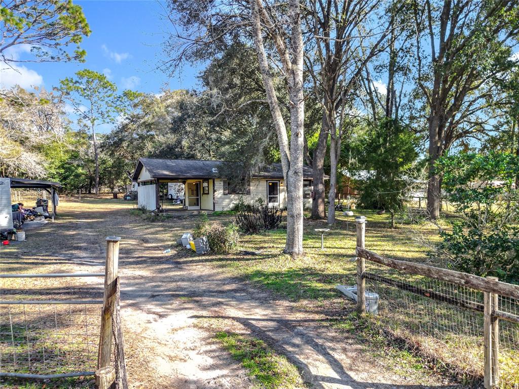 3175 Southwest 181st Court Dunnellon, FL 34432 - Photo 2 of 35 a view of a house with backyard