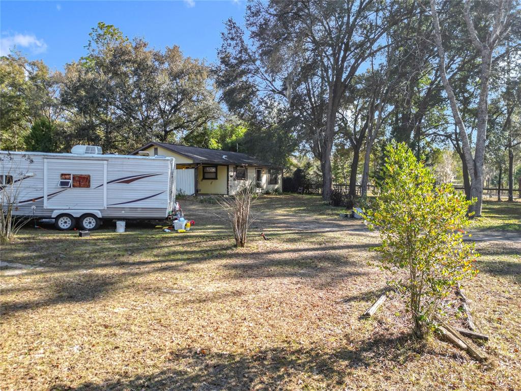 3175 Southwest 181st Court Dunnellon, FL 34432 - Photo 23 of 35 a view of a house with a big yard