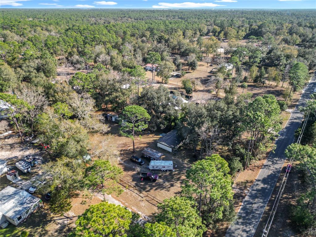 3175 Southwest 181st Court Dunnellon, FL 34432 - Photo 31 of 35 an aerial view of residential house with outdoor space and trees all around
