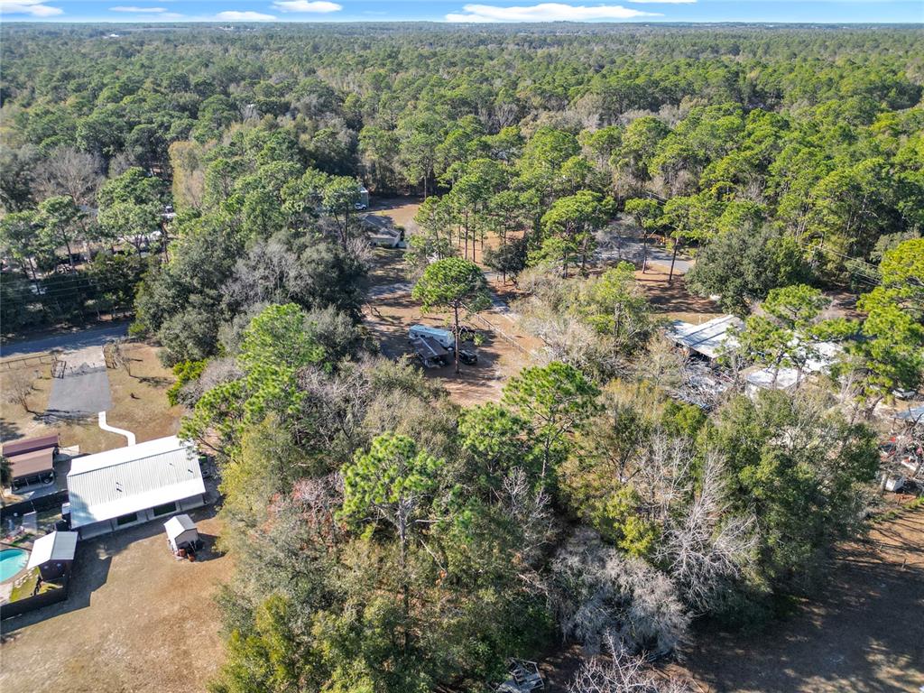 3175 Southwest 181st Court Dunnellon, FL 34432 - Photo 32 of 35 an aerial view of a house with a yard