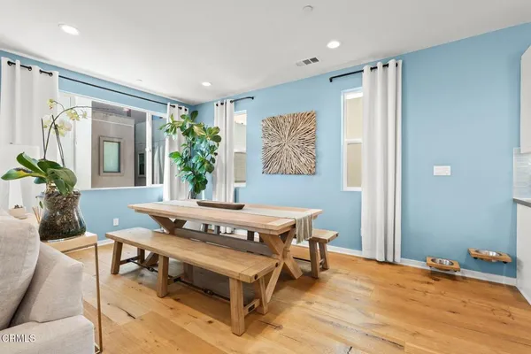 a workspace with furniture and window