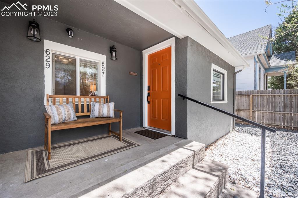 627 Alexander Road Colorado Springs, CO 80909 - Photo 23 of 40 a view of balcony with couch