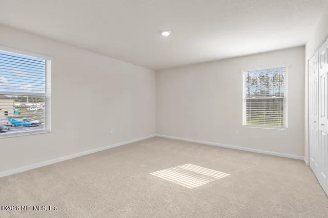 an empty room with windows