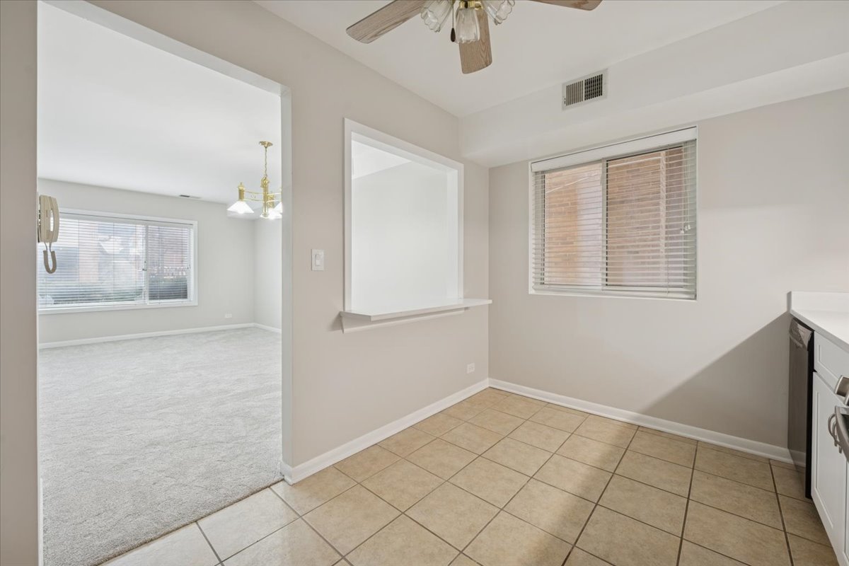 7320 Lake Street, Unit 1A River Forest, IL 60305 - Photo 14 of 22 a view of an empty room with a window