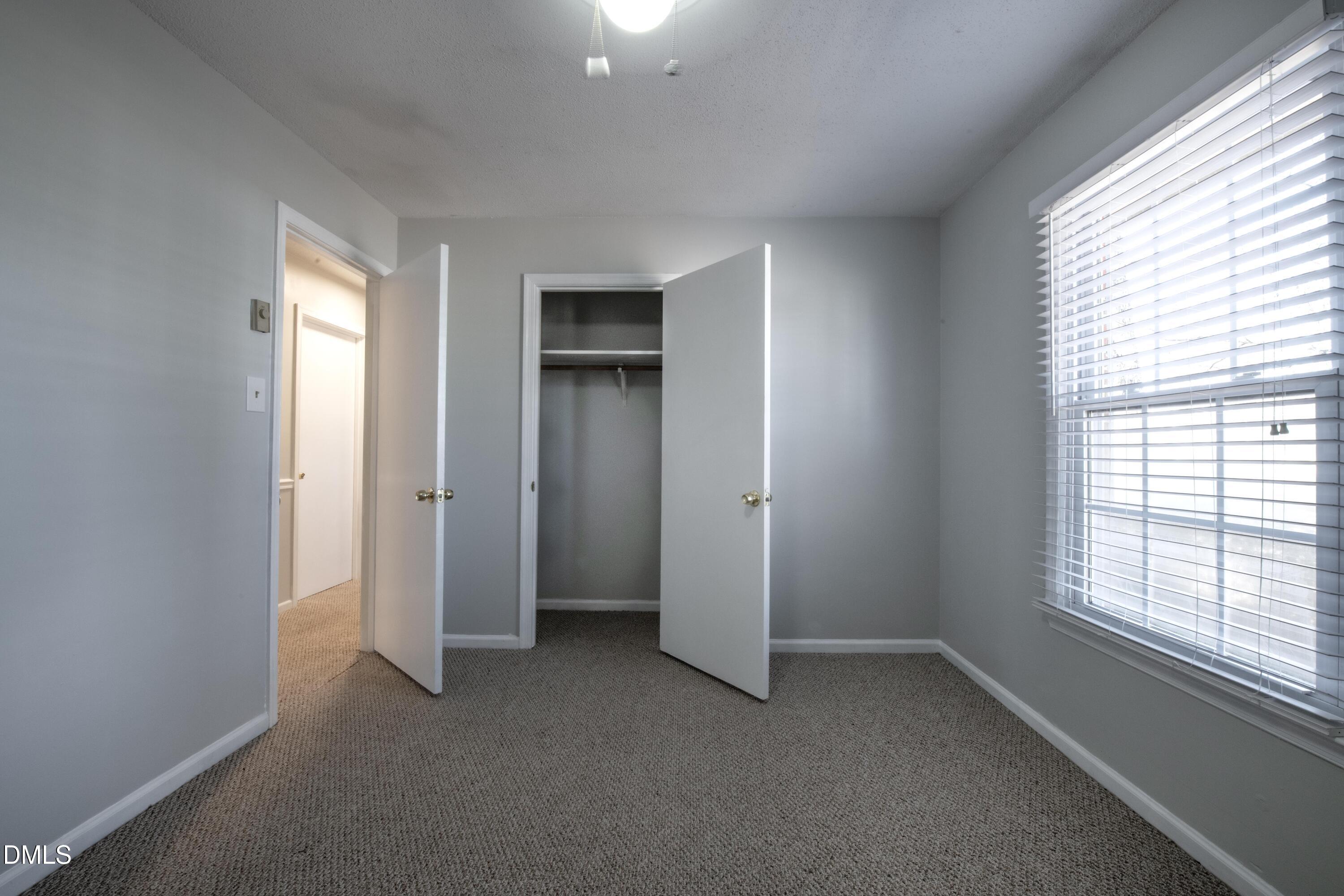 116 East Judd Street Zebulon, NC 27597 - Photo 16 of 21 a view of empty room with window