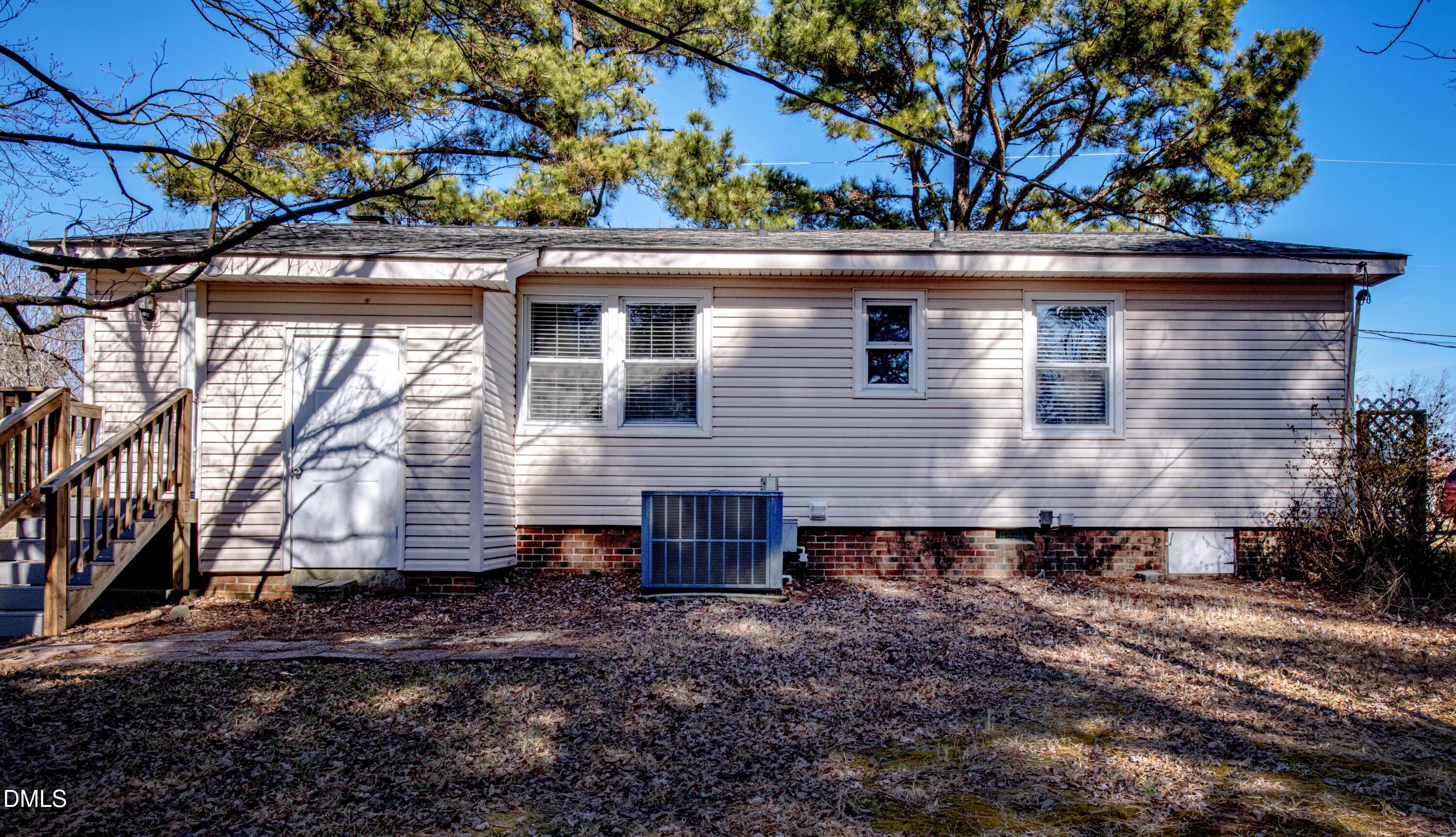 116 East Judd Street Zebulon, NC 27597 - Photo 2 of 21 a small hut with trees in the background