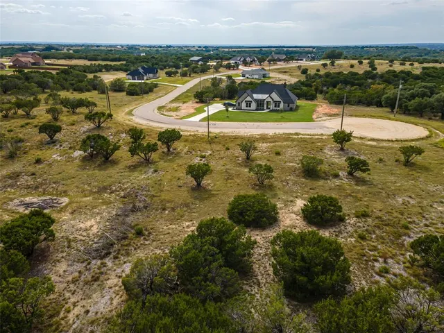 a view of a swimming pool with an ocean view