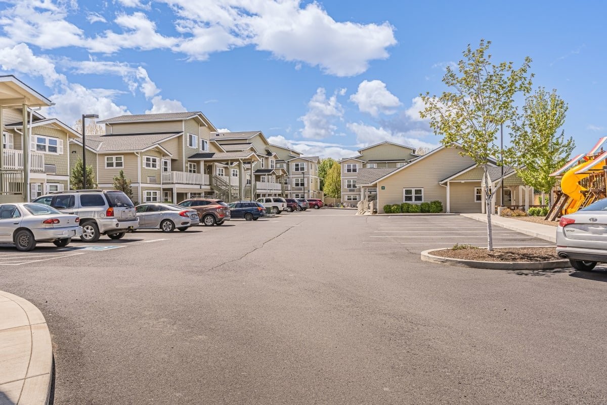 2201 Southwest Canal Boulevard Redmond, OR 97756 - Photo 2 of 10 a view of road with card and parked cars