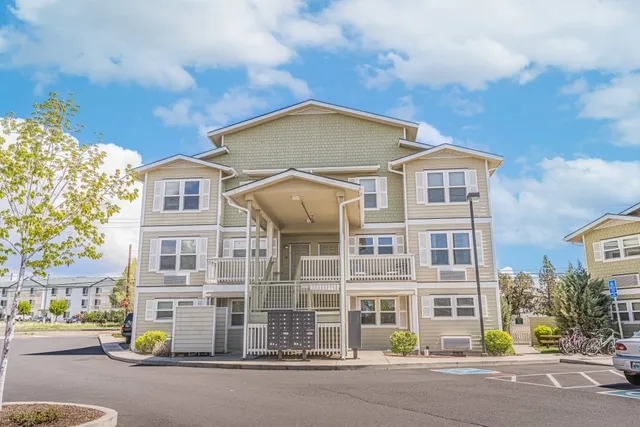 a view of a building with a street