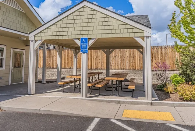 a view of swimming pool with outdoor seating