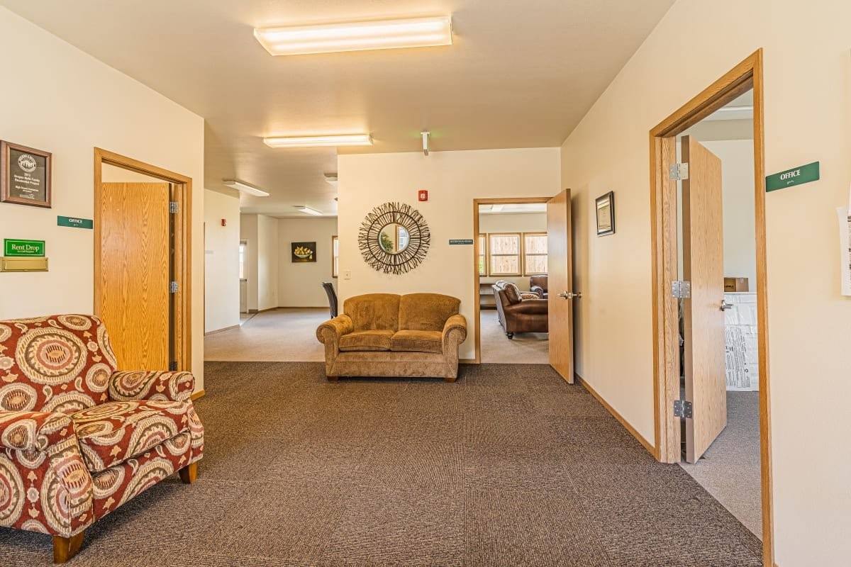 2201 Southwest Canal Boulevard Redmond, OR 97756 - Photo 7 of 10 a living room with furniture and a window