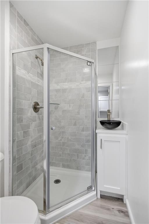 715 5th Street New Brighton, PA 15066 - Photo 15 of 30 a bathroom with a shower a toilet and a sink