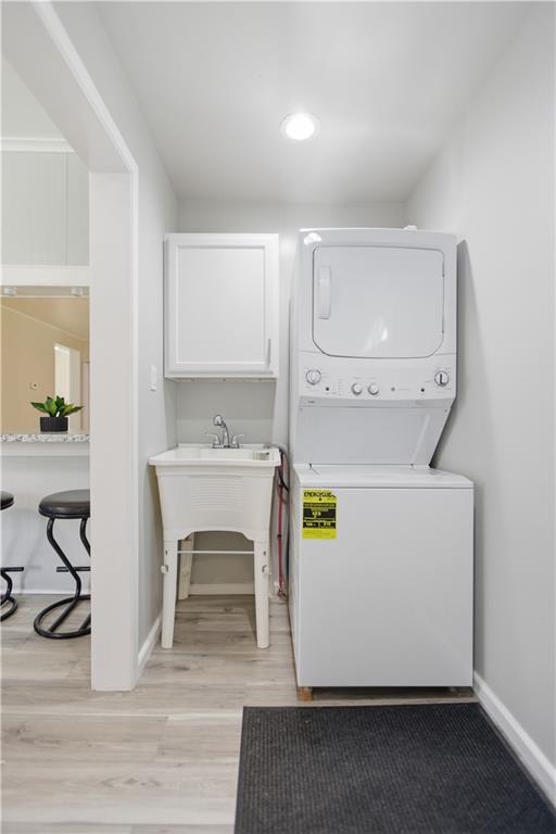 715 5th Street New Brighton, PA 15066 - Photo 16 of 30 a utility room with cabinets washer and dryer