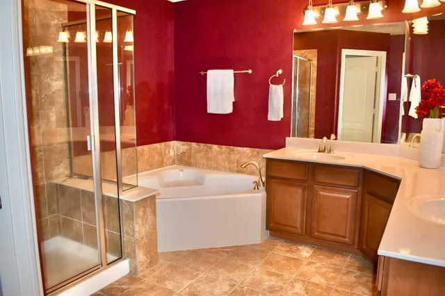 a bathroom with a sink a vanity and a mirror