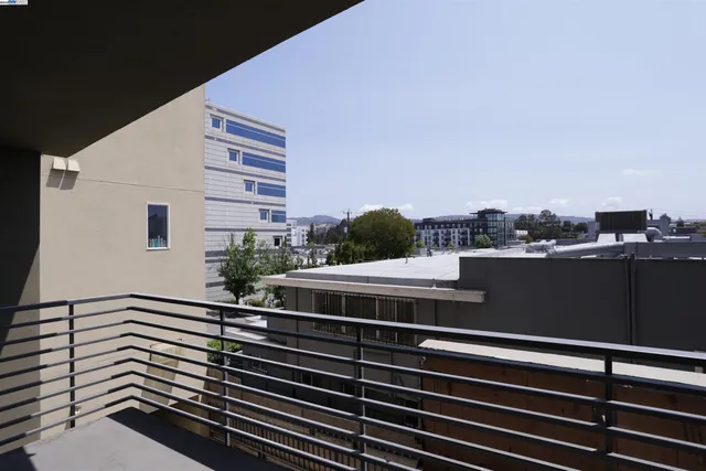 a view of a building from a balcony