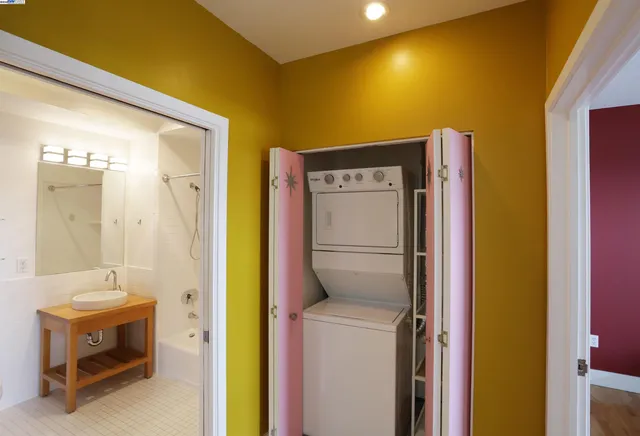 a utility room with dryer and washer