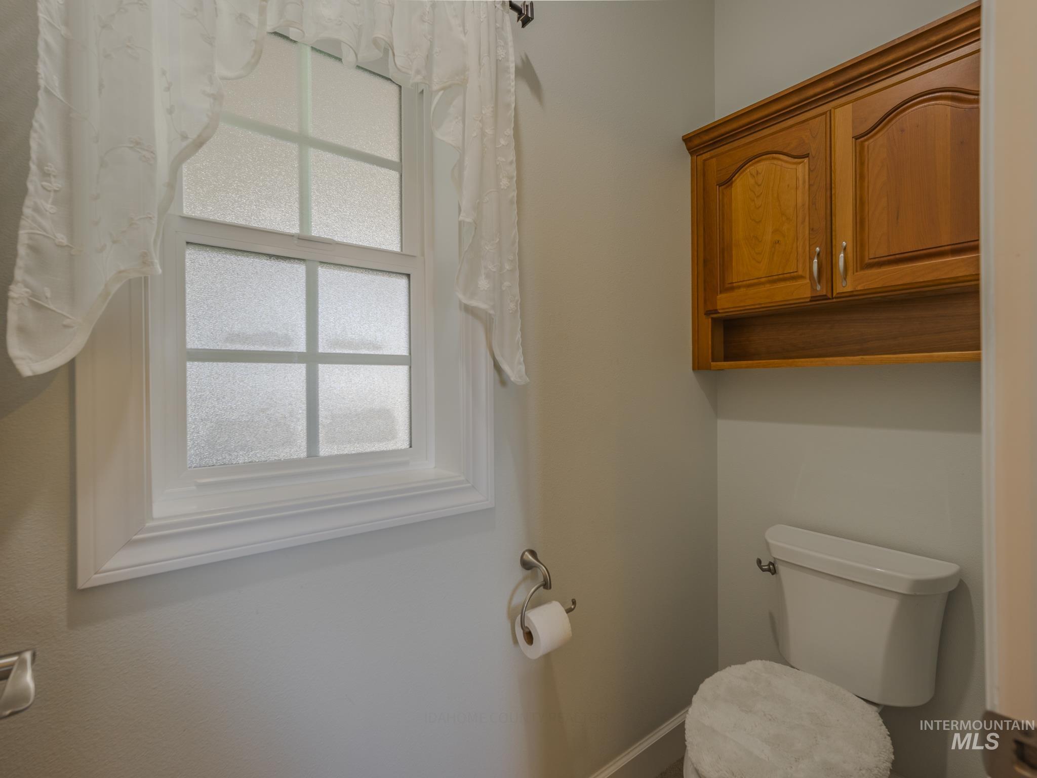 659 Reservation Line Road Cottonwood, ID 83522 - Photo 30 of 50 Bathroom featuring toilet