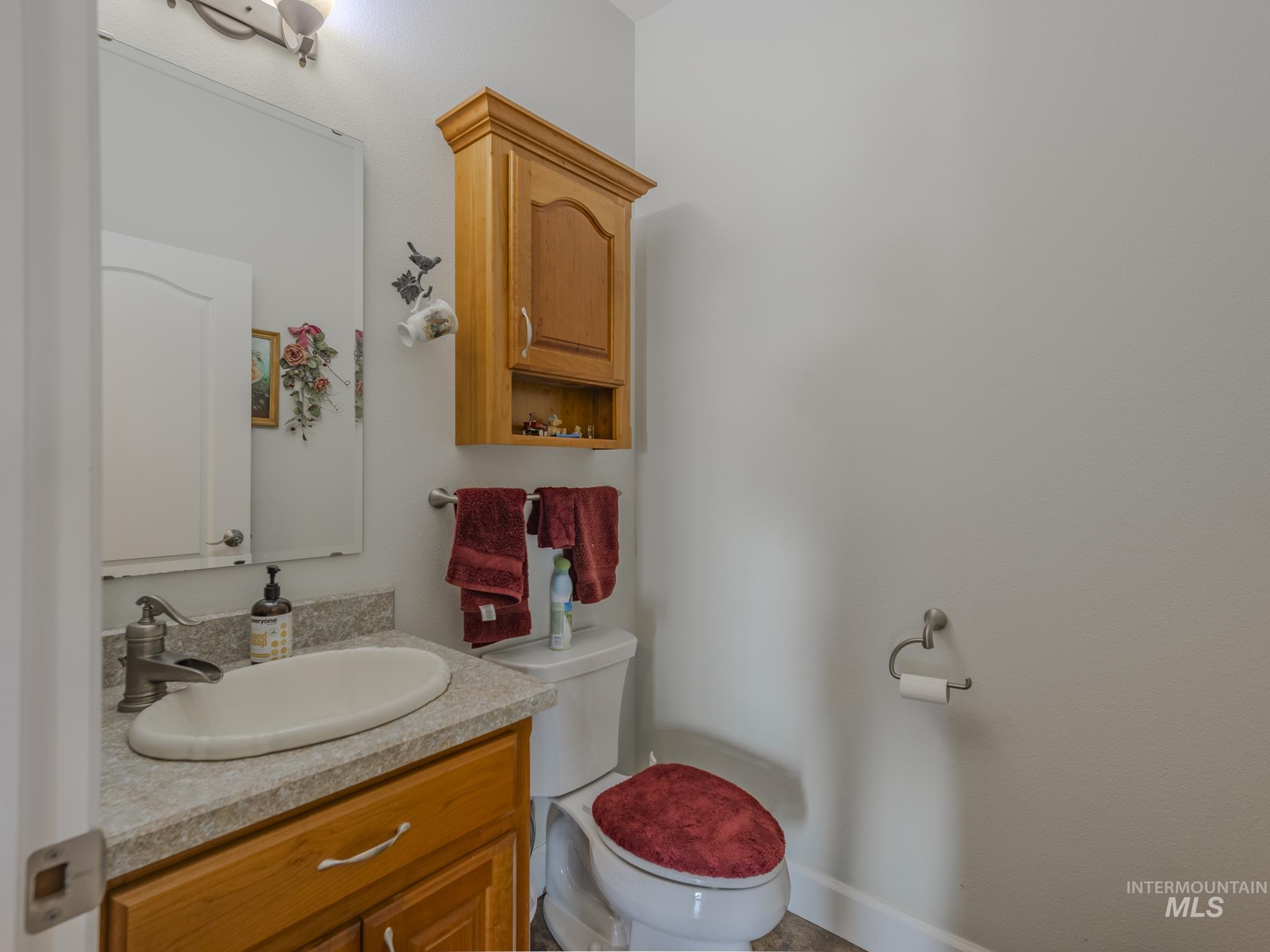 659 Reservation Line Road Cottonwood, ID 83522 - Photo 33 of 50 Bathroom with vanity and toilet