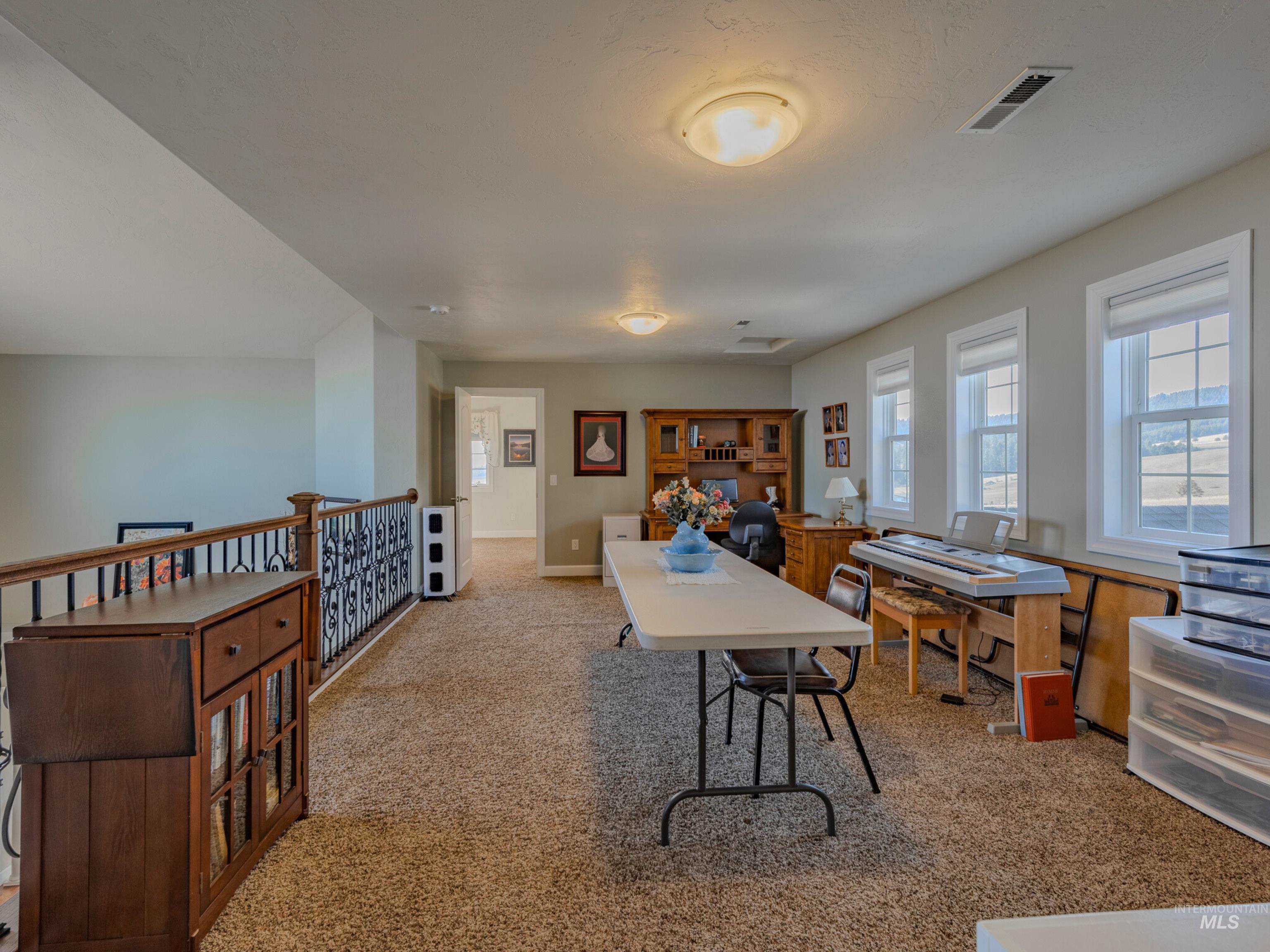 659 Reservation Line Road Cottonwood, ID 83522 - Photo 36 of 50 Office featuring light colored carpet and baseboards