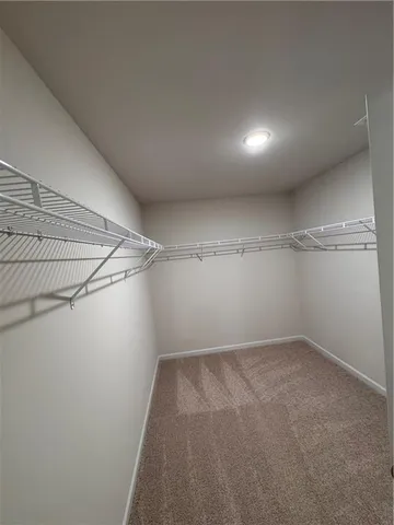 a view of a room with an empty space