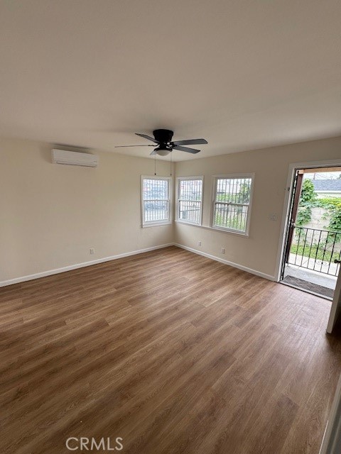11220 Concert Street El Monte, CA 91731 - Photo 2 of 11 wooden floor in an empty room with a window