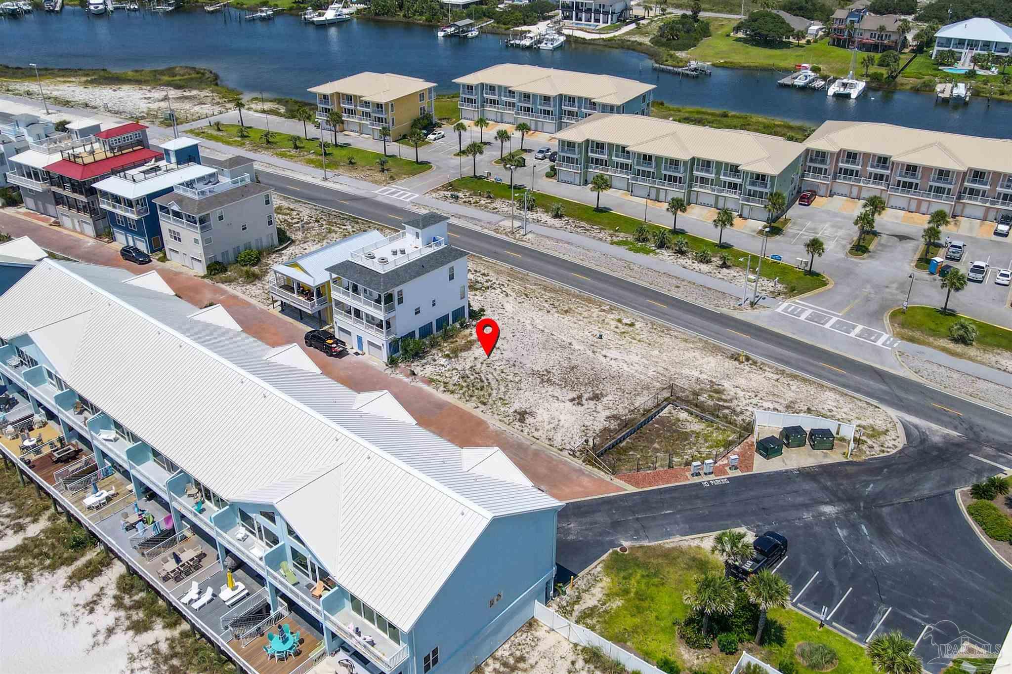 533 Fort Pickens Road Pensacola Beach, FL 32561 - Photo 11 of 32 an aerial view of a house with a swimming pool