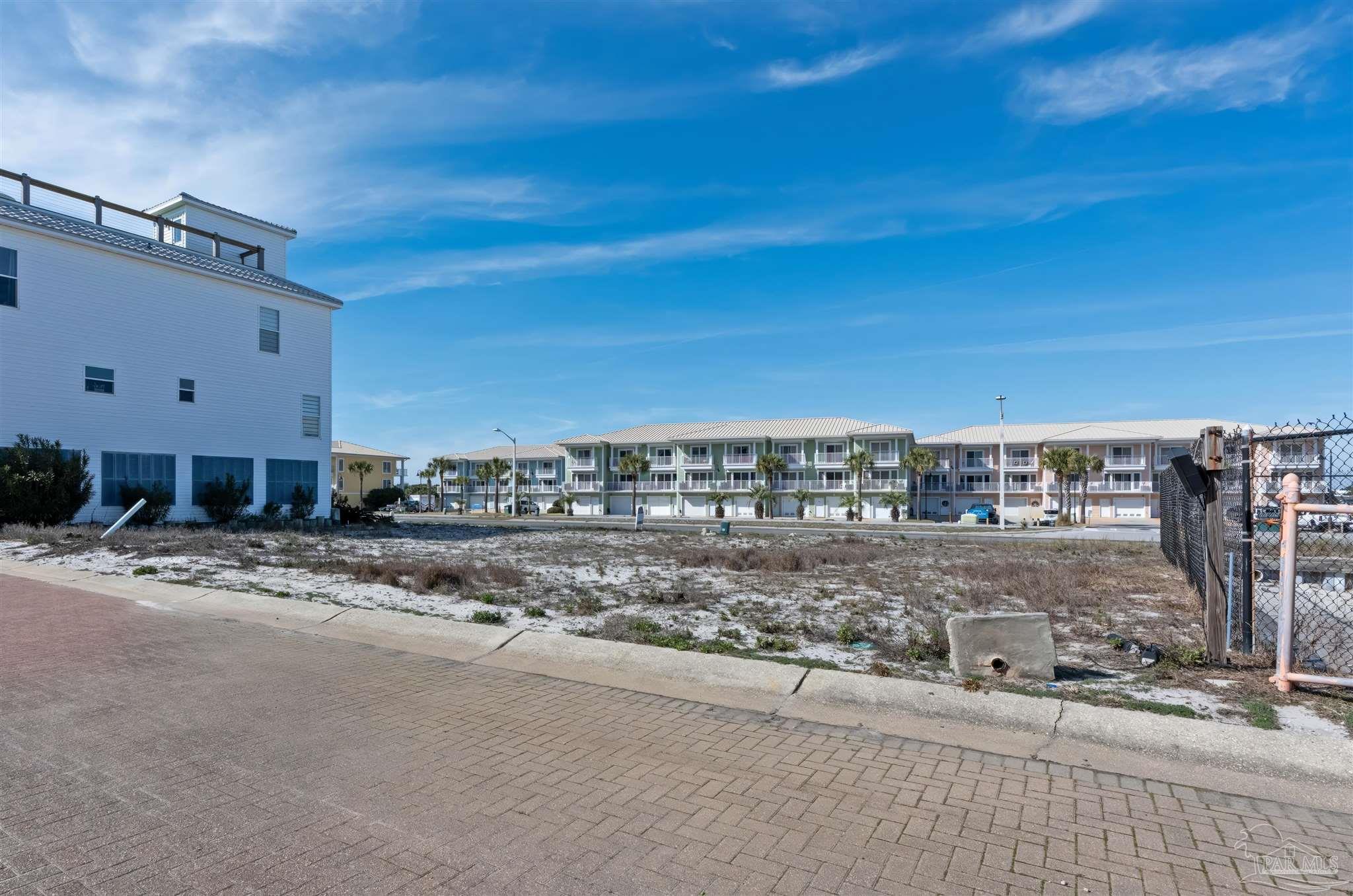 533 Fort Pickens Road Pensacola Beach, FL 32561 - Photo 16 of 22 a view of a building with a road