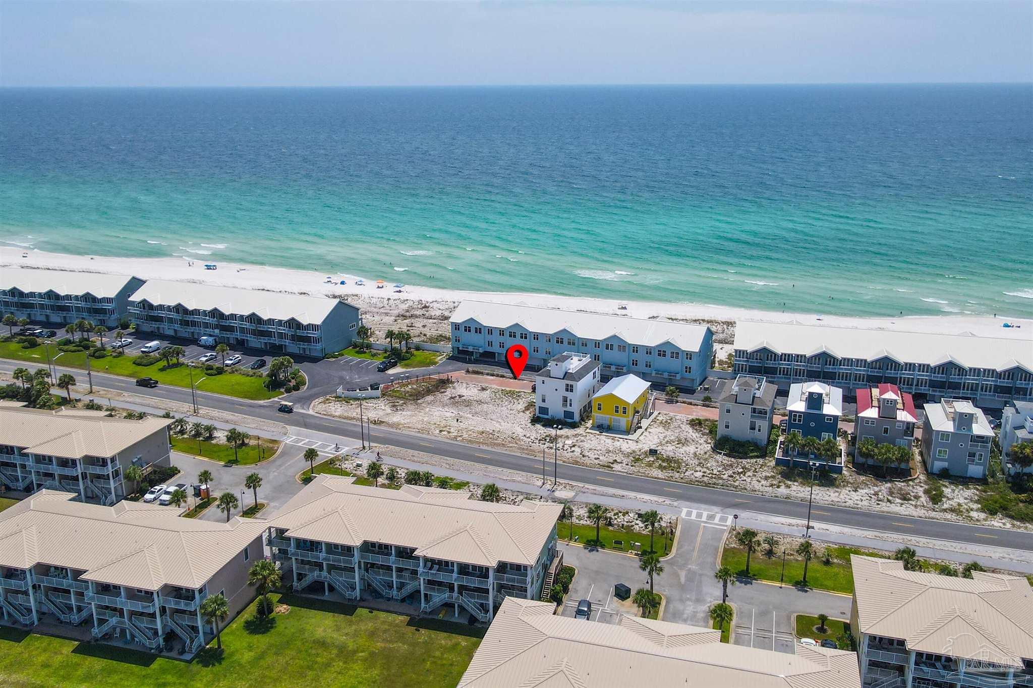 533 Fort Pickens Road Pensacola Beach, FL 32561 - Photo 9 of 22 a view of swimming pool with outdoor seating and a shower