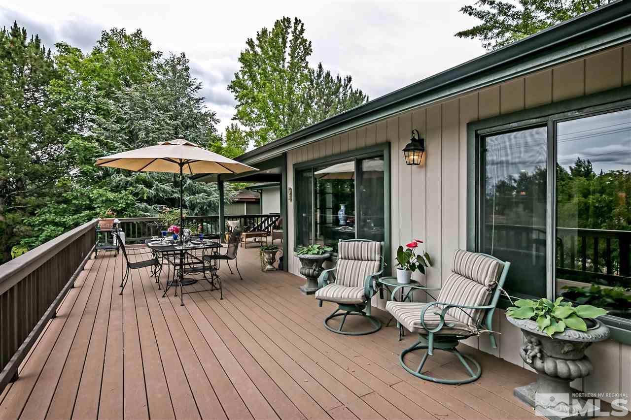 2275 Pennswood Way Reno, NV 89509 - Photo 17 of 33 a view of a patio with furniture and a yard