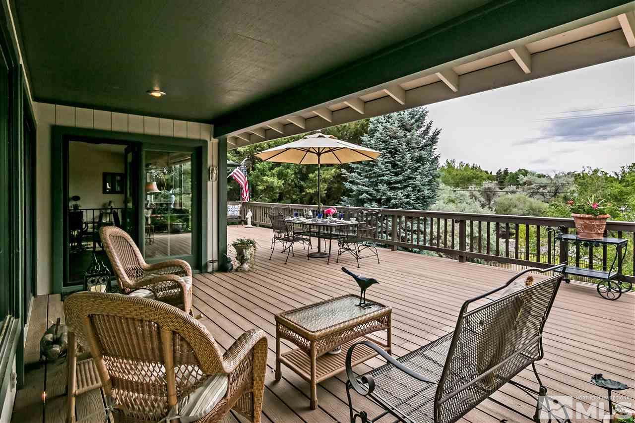 2275 Pennswood Way Reno, NV 89509 - Photo 18 of 33 a view of a patio with a table and chairs