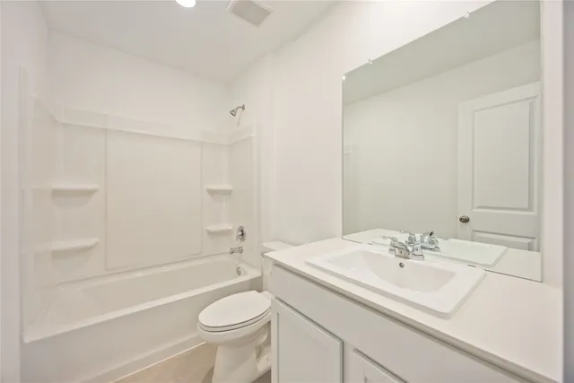 a view of a hallway with washer and dryer