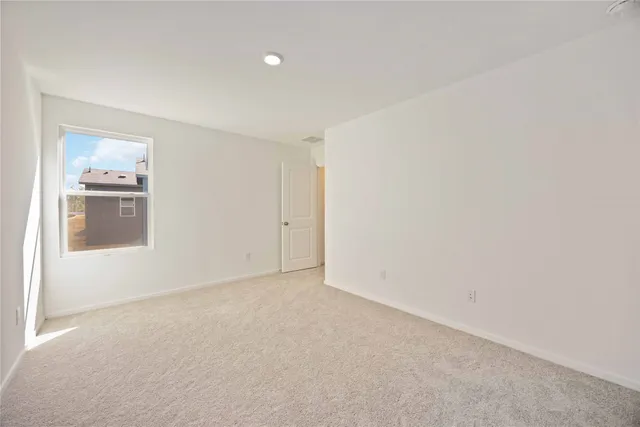 an empty room with an entryway