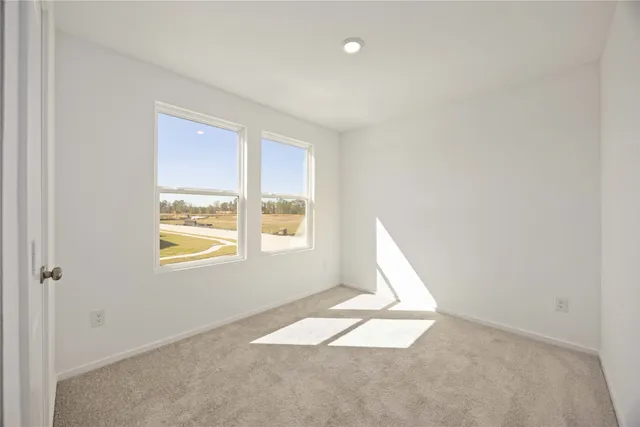 a view of a small space with window in it